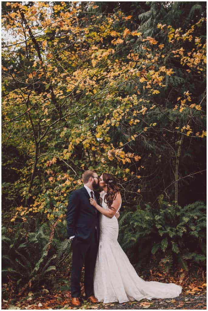Kissing outside of the Snohomish wedding venue