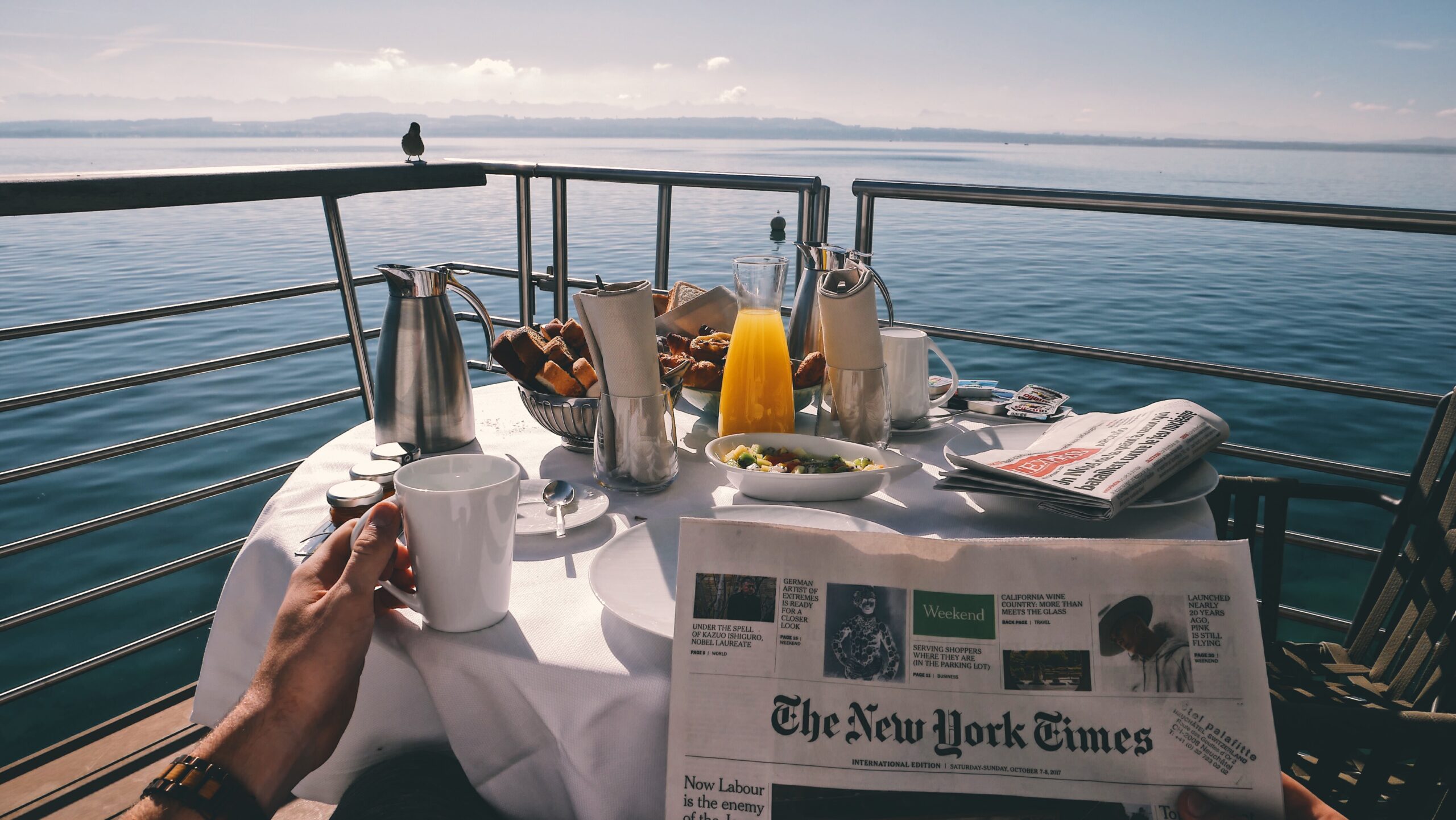 Having breakfast and reading on the balcony of your Alaskan cruise wedding